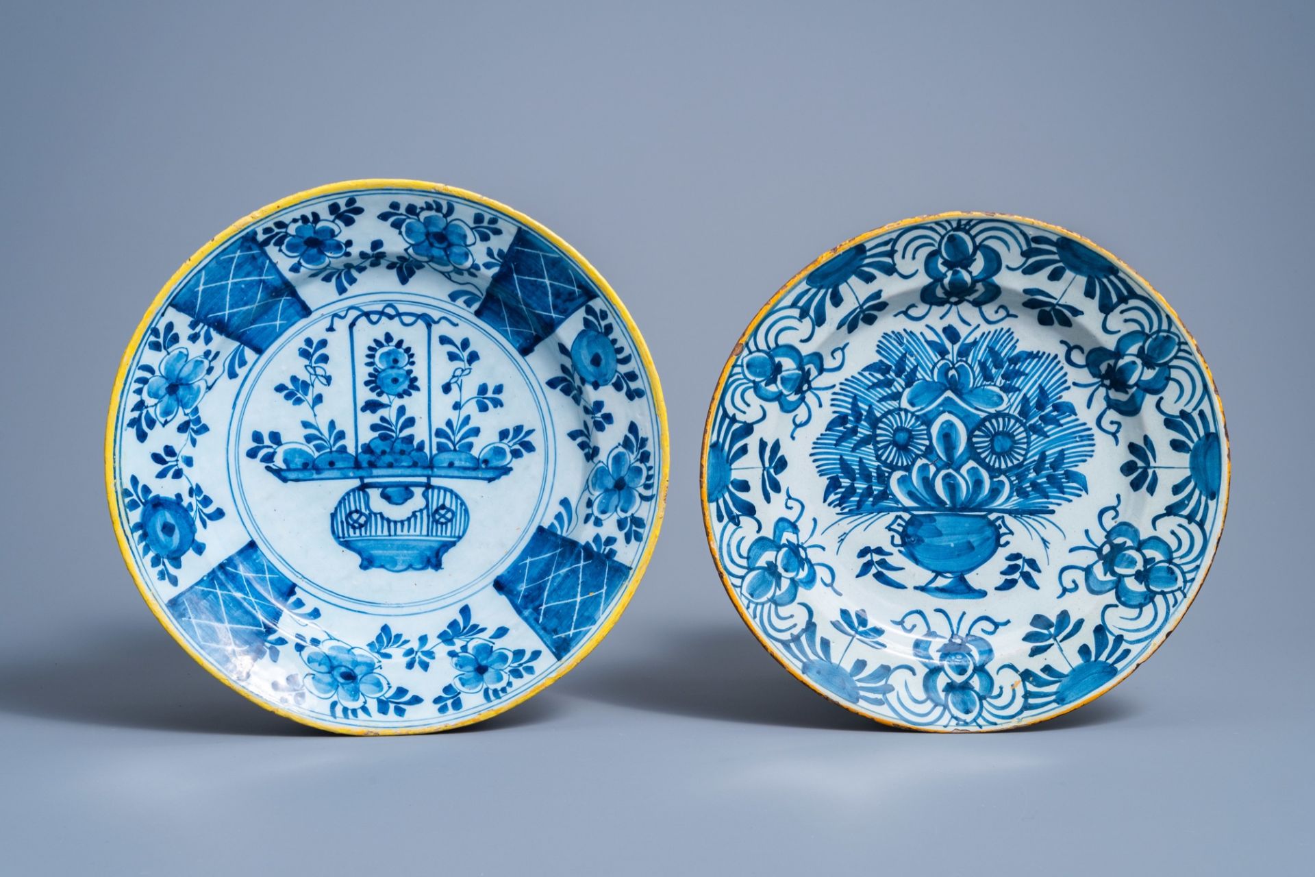 A Brussels blue and white tobacco jar, six Dutch Delft plates with floral design and a holy water fo - Image 3 of 14