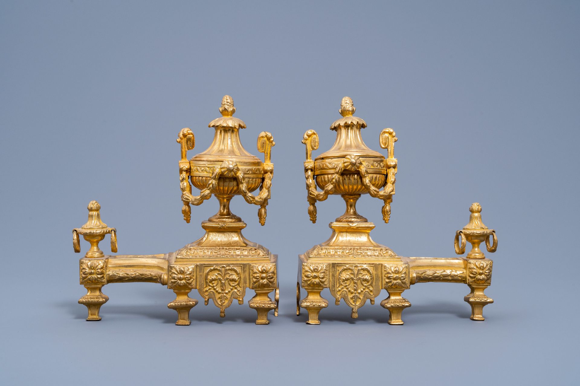 A pair of French Louis XVI style gilt bronze chenets and fire fender, 19th/20th C. - Image 3 of 11