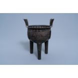 A Chinese bronze tripod censer, Ming/Qing