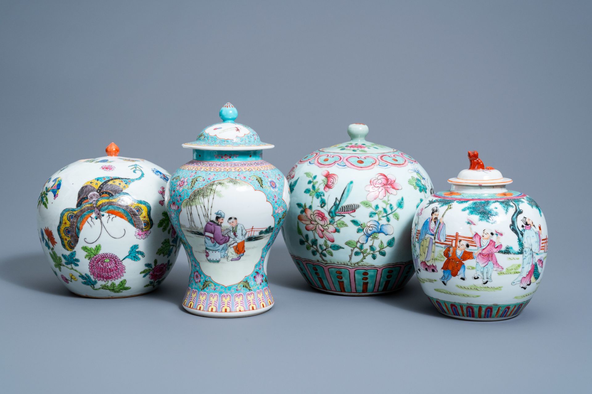 Four various Chinese famille rose jars and vases and covers with insects among blossoming branches a