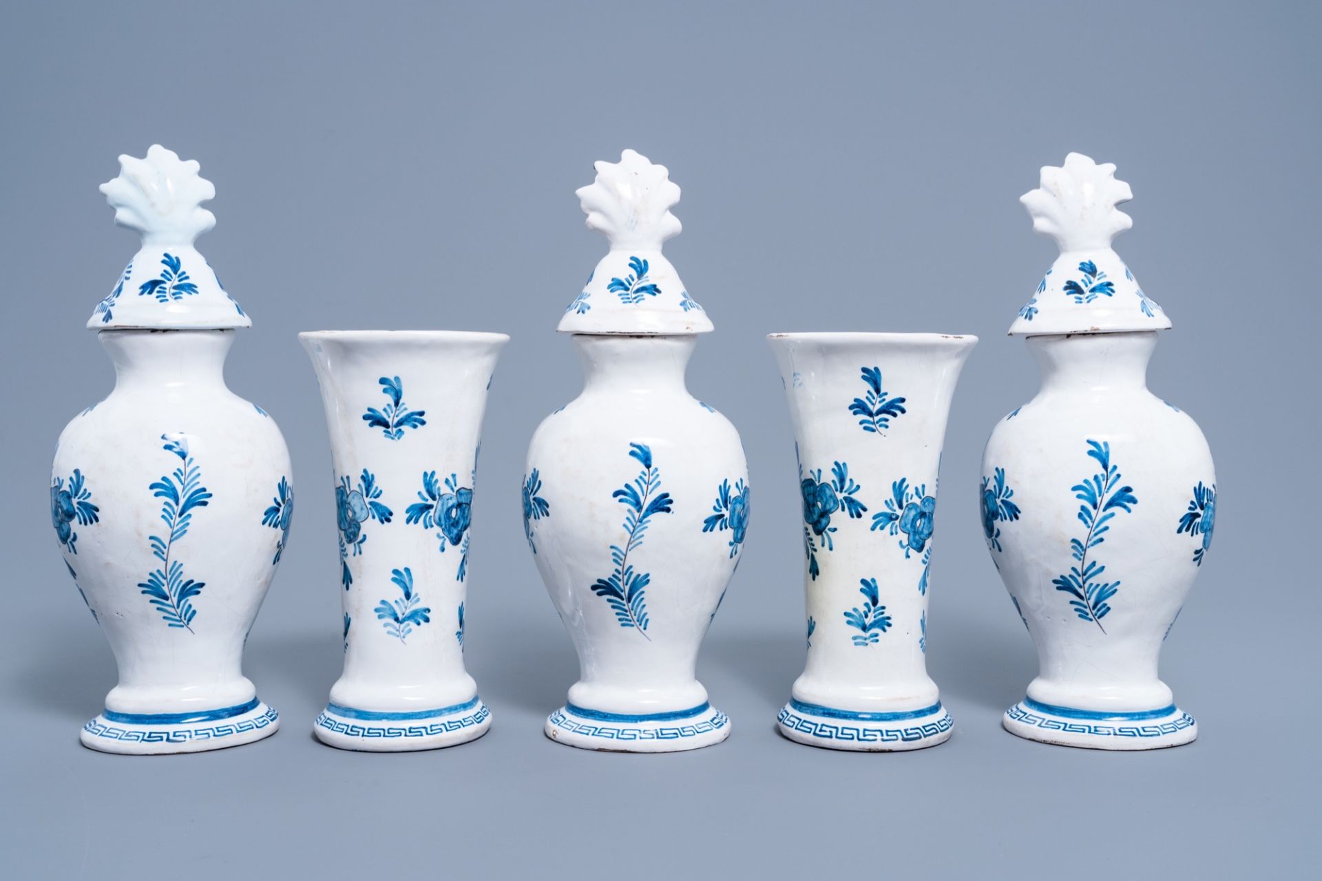A five-piece Dutch Delft blue and white vase garniture with ice skaters, 19th C. - Image 3 of 6