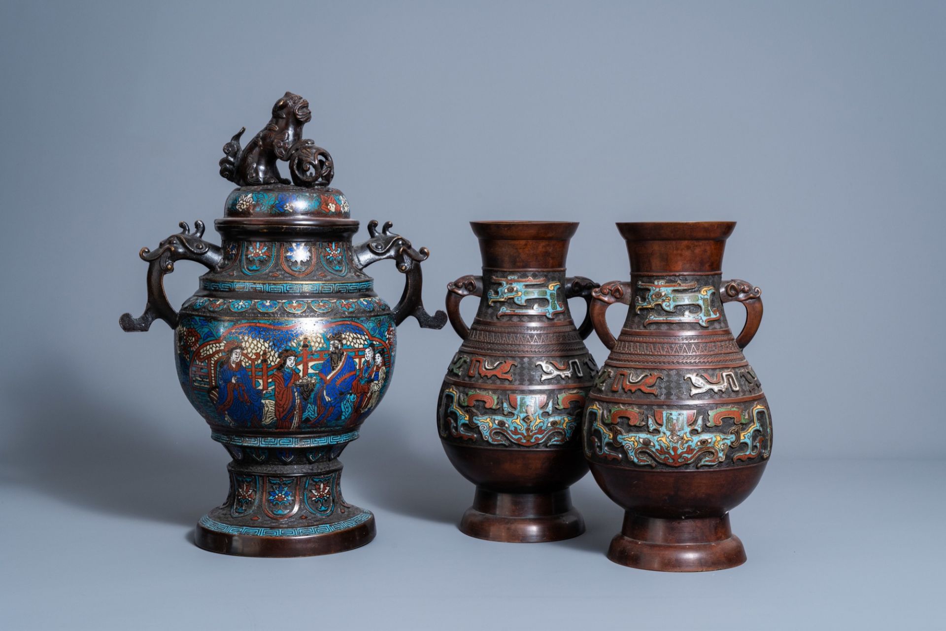 A pair of Chinese or Japanese cloisonnŽ and champlevŽ enamel vases and a 'koro' incense burner, Meij