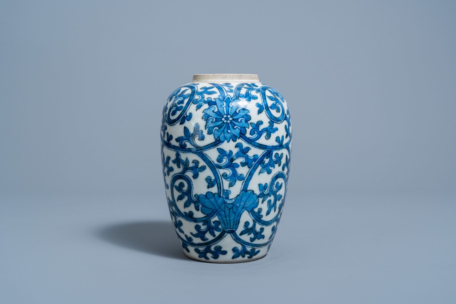 A Chinese blue and white 'lotus scrolls' jar, 19th C. - Image 2 of 7