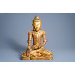 A tall inlaid gilt wood figure of a seated Buddha, Burma or Thailand, 20th C.