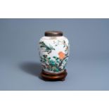 A Chinese famille verte jar with a phoenix among blossoming branches, 19th C.