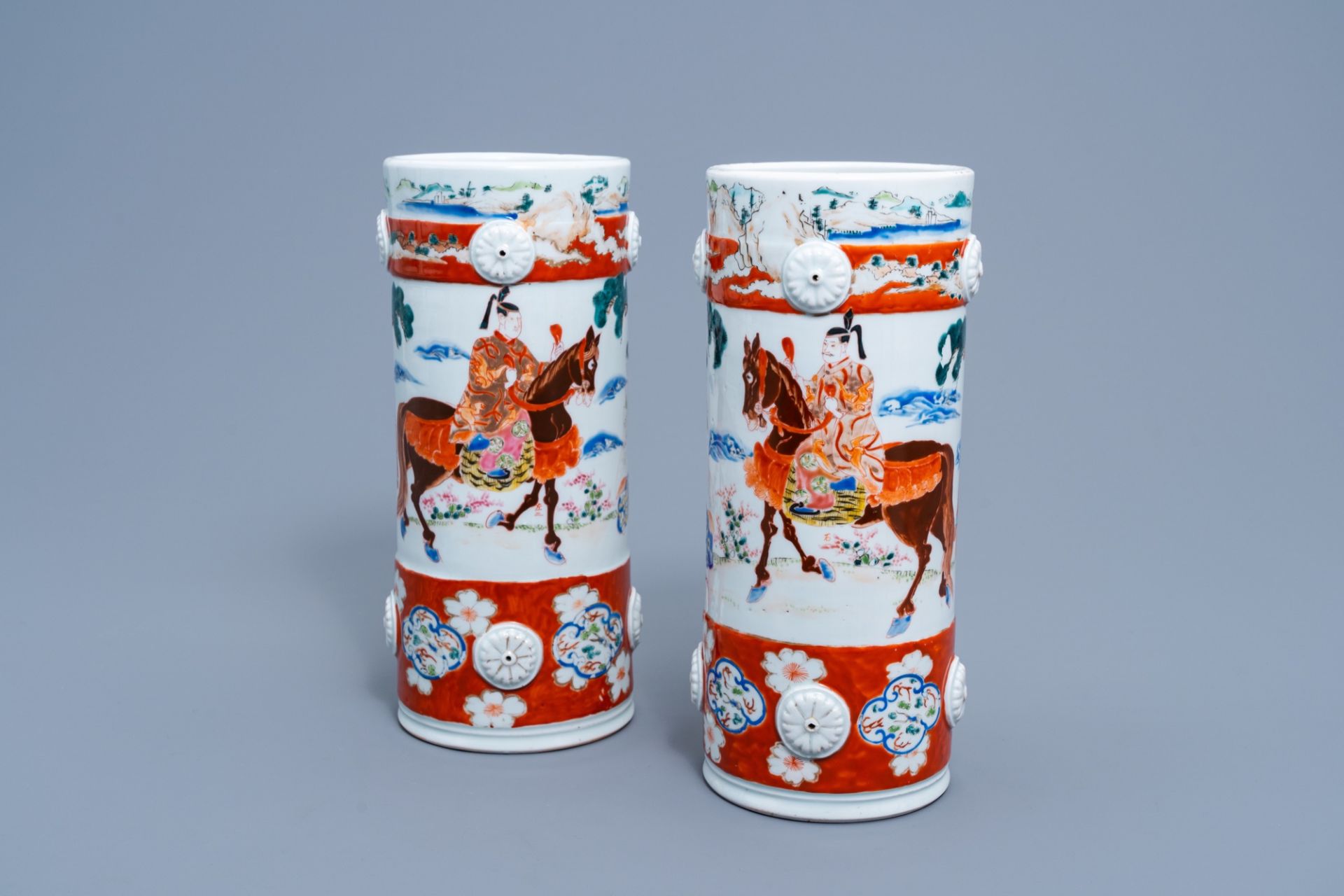 A pair of Japanese polychrome hat stand stands with figurative design all around, marked Fukagawa, M
