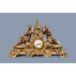 A large French gilt brass mantel clock depicting science, 19th/20th C.