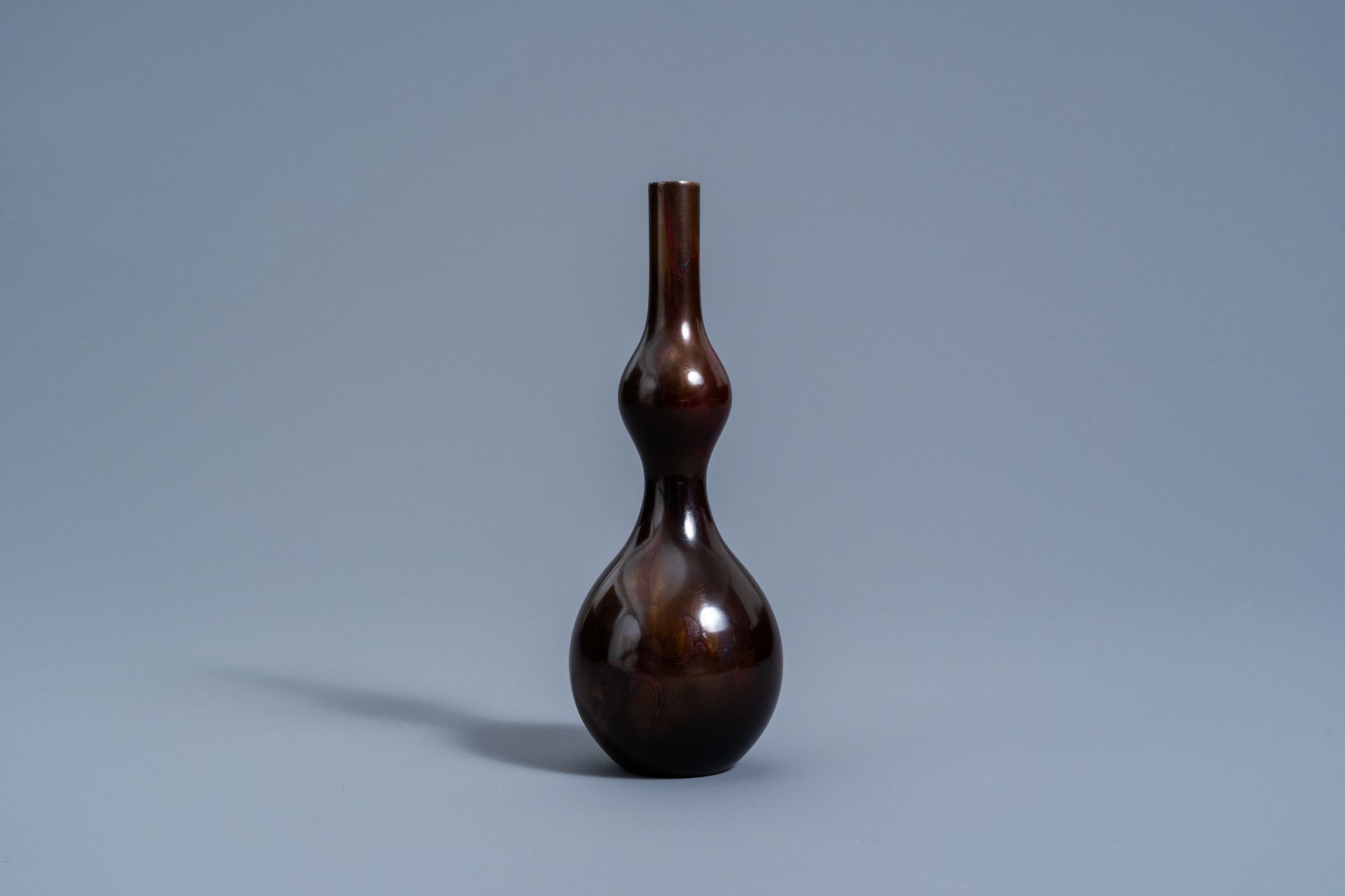 A Japanese bronze double gourd vase with flamed brown patina, Yoshida Kazumas, Showa, 20th C. - Image 5 of 8