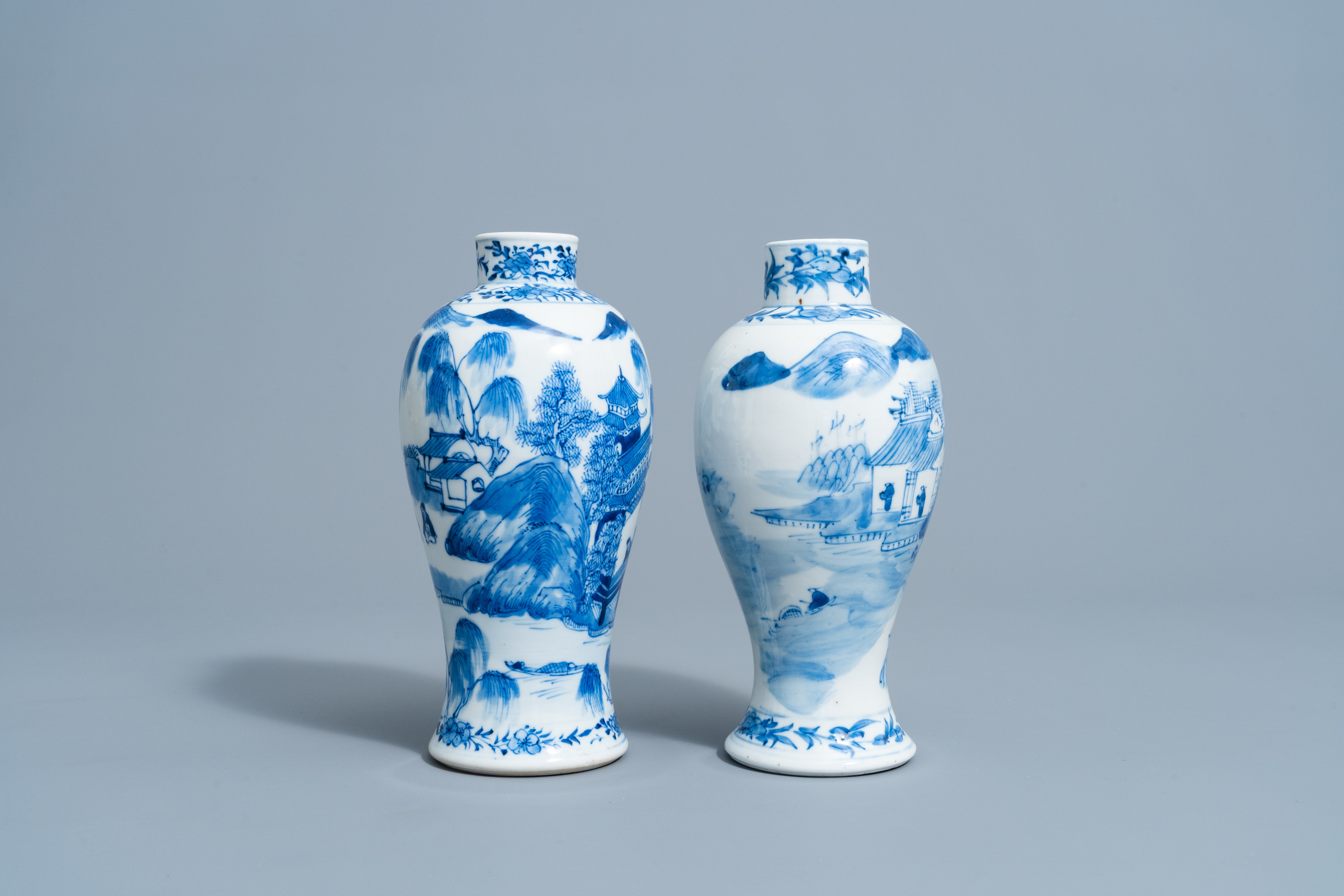 Two Chinese blue and white baluster shaped vases with an animated mountain landscape all around, Kan - Image 4 of 6