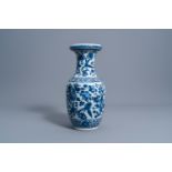 A Chinese blue and white vase with birds among blossoming branches, 19th C.