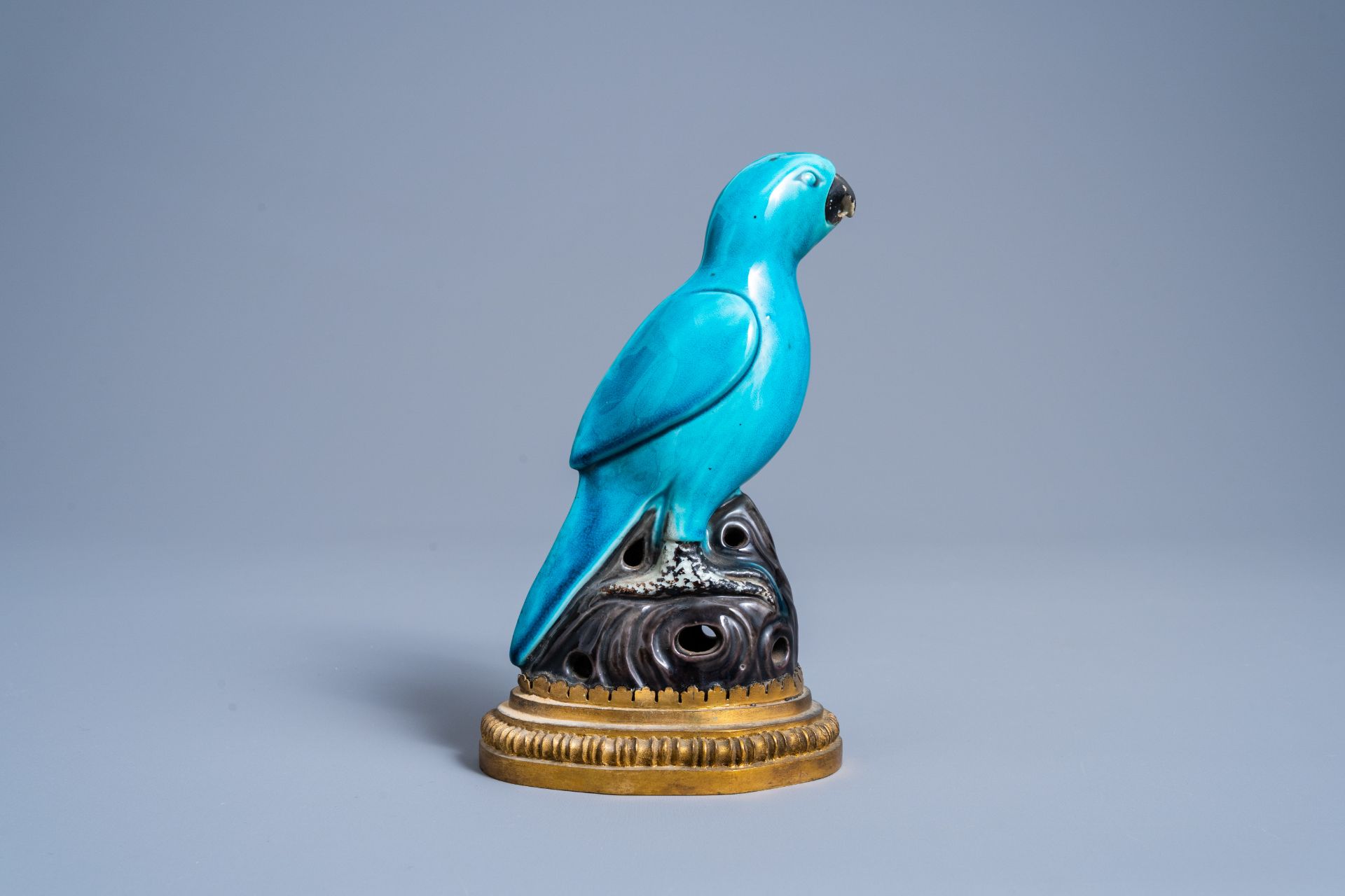 Two Chinese famille rose and verte plates and a turquoise and aubergine glazed parrot, 19th C. - Image 7 of 10