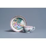 A Chinese famille rose cup and saucer with European subjects, Qianlong