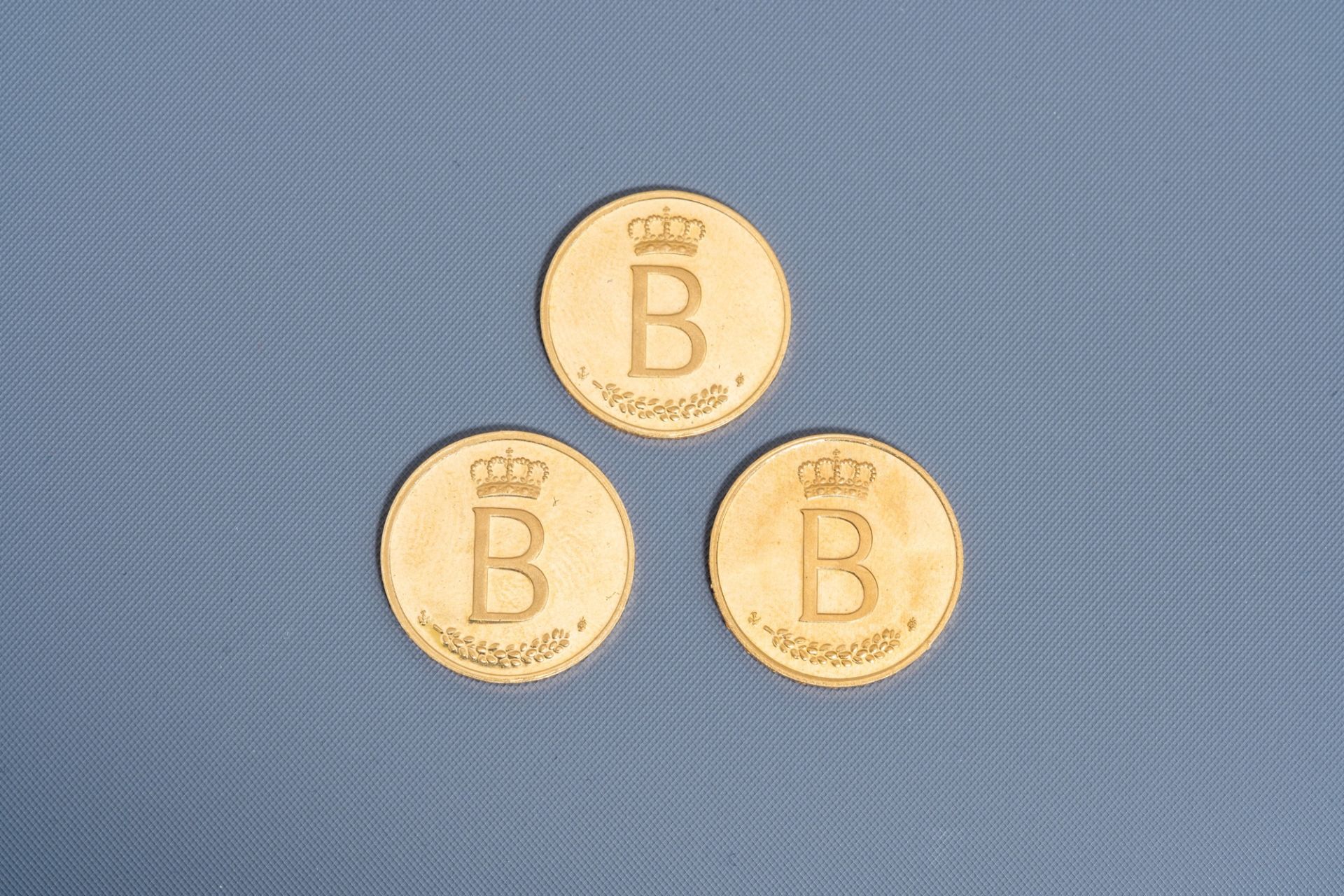 Three Belgian 21,6 carat yellow gold coins on the occasion of the 25th anniversary of King Baudouin