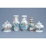 Five Chinese qianjiang cai and famille verte vases and jars and covers with figures in a landscape,