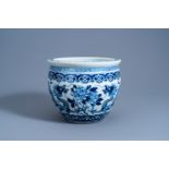 A Chinese blue and white 'dragons' jardinire, 19th C.