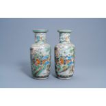 A pair of Chinese Nanking craquelŽ famille verte 'warrior' vases, 19th C.