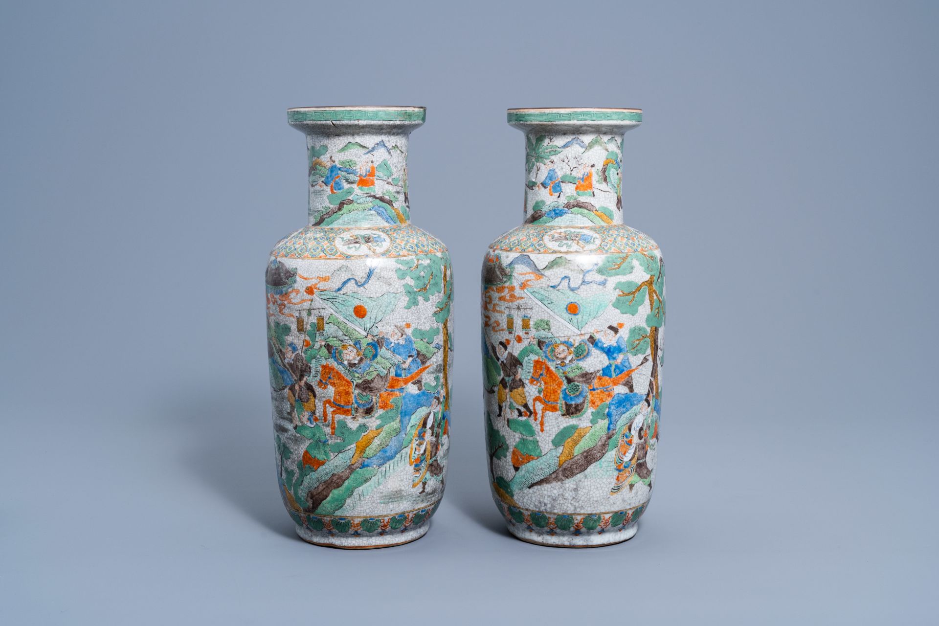 A pair of Chinese Nanking craquelŽ famille verte 'warrior' vases, 19th C.