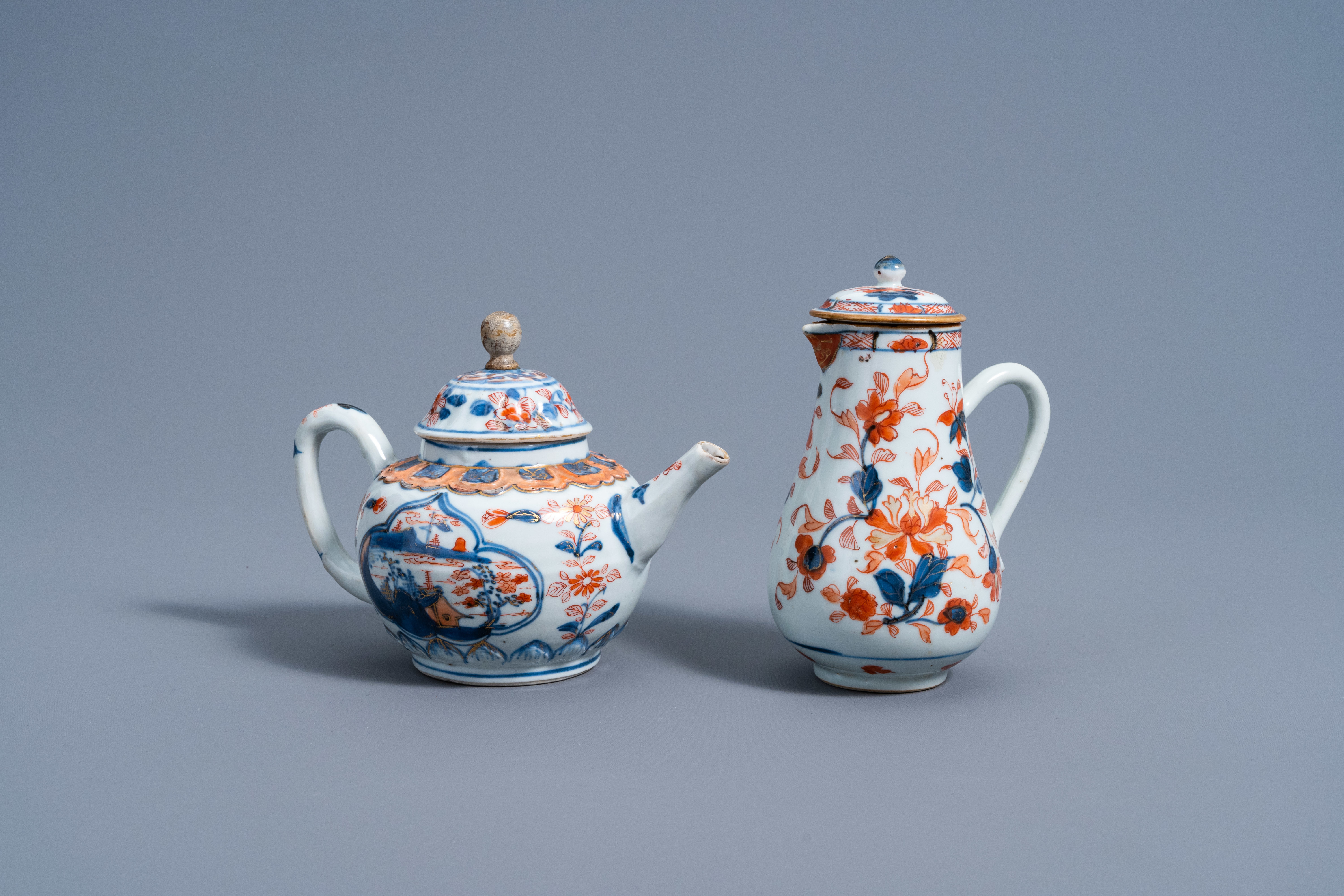 A Chinese Imari-style teapot and a jug and cover with floral design, Kangxi