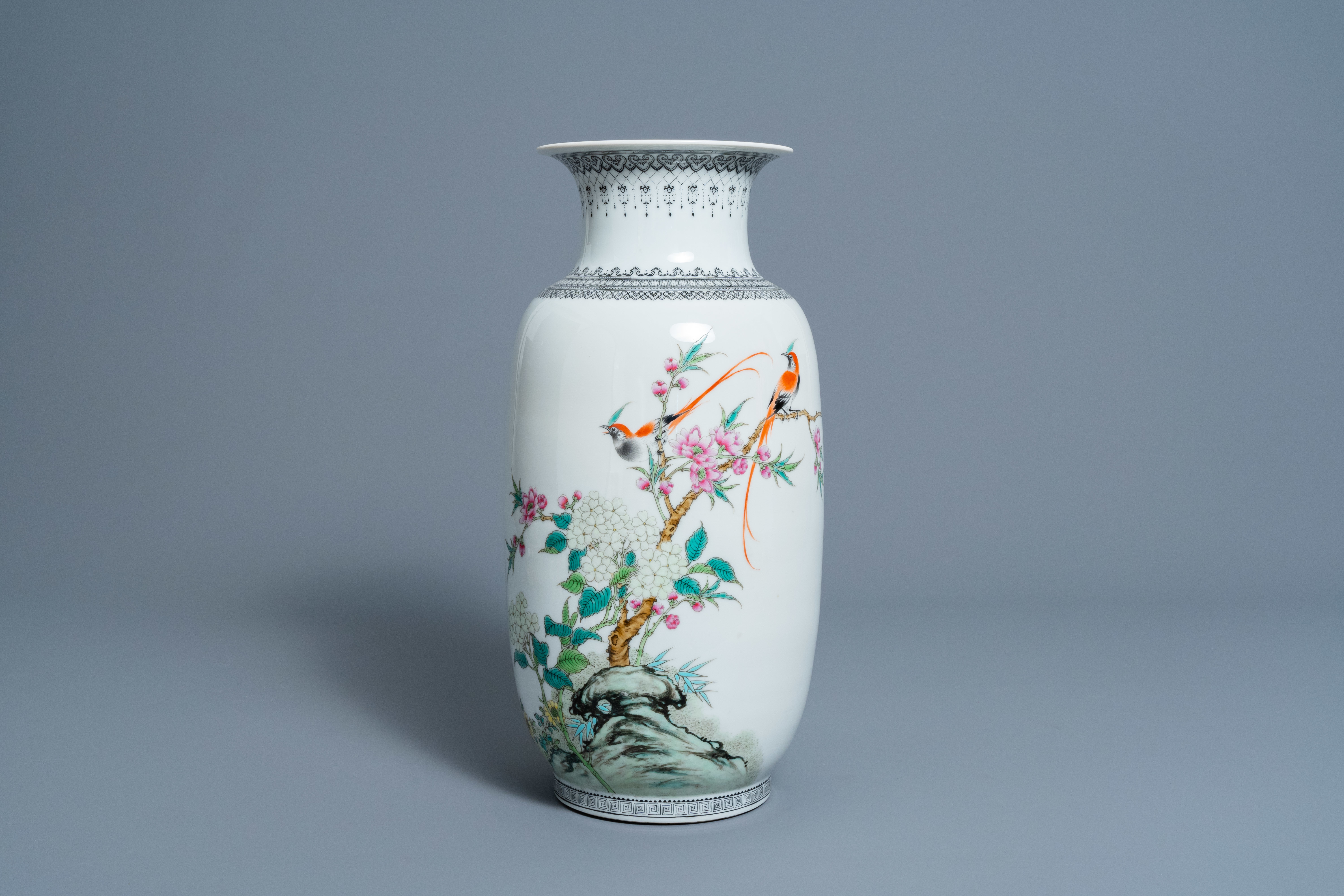 A Chinese famille rose vase with birds among blossoming branches, Republic, 20th C.