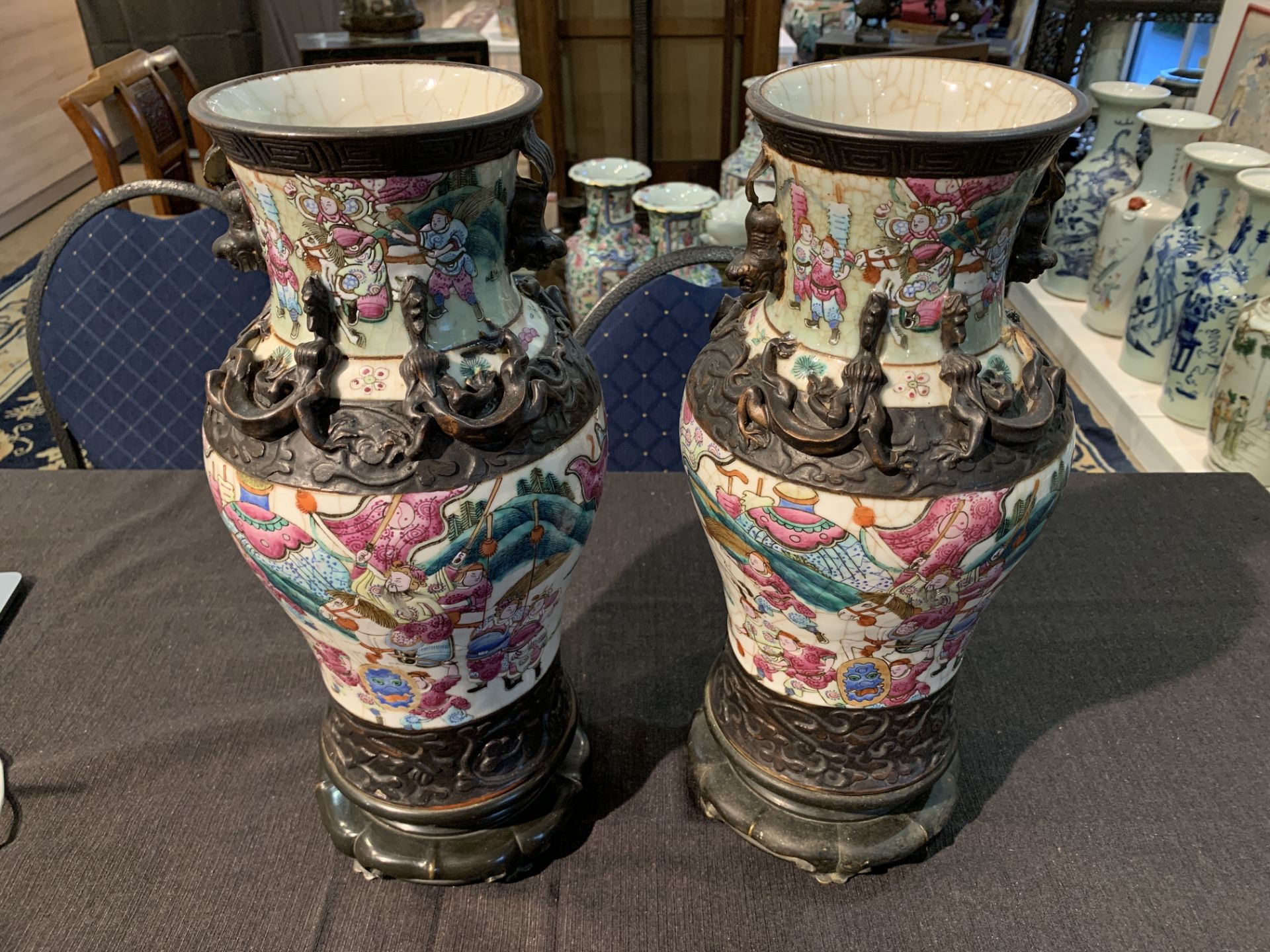 A pair of Chinese Nanking crackle glazed famille rose vases with warrior scenes on bronze lotus shap - Image 9 of 11