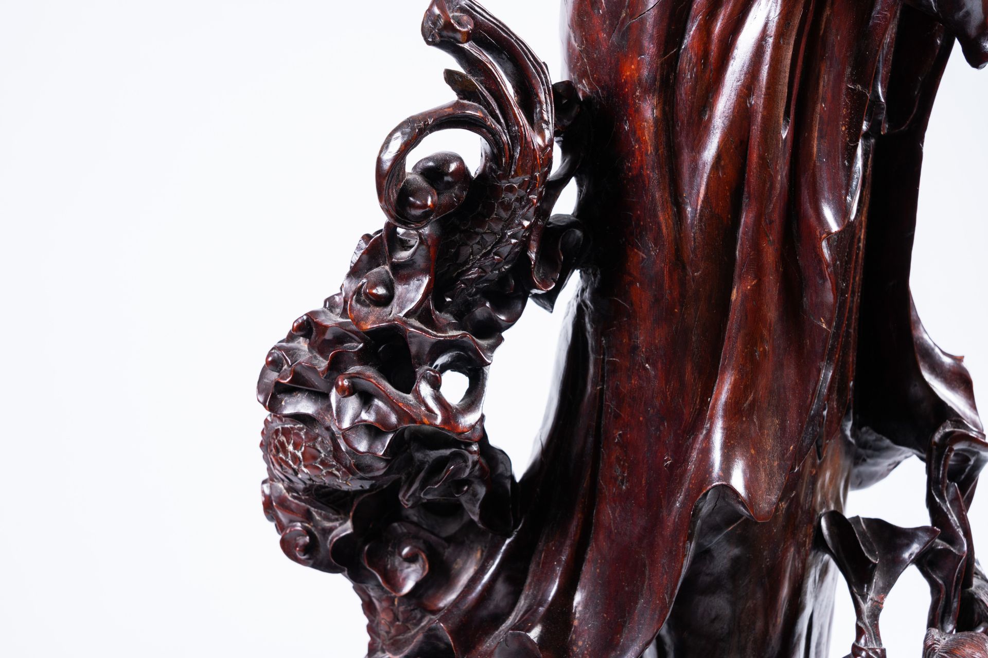A massive Chinese carved wood group with a Guanyin, children and a dragon, 20th C. - Image 10 of 14