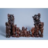 A varied collection of nine Chinese carved wood figures, 19th/20th C.