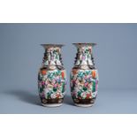 A pair of Chinese Nanking crackle glazed famille rose vases with warrior scenes, 19th C.