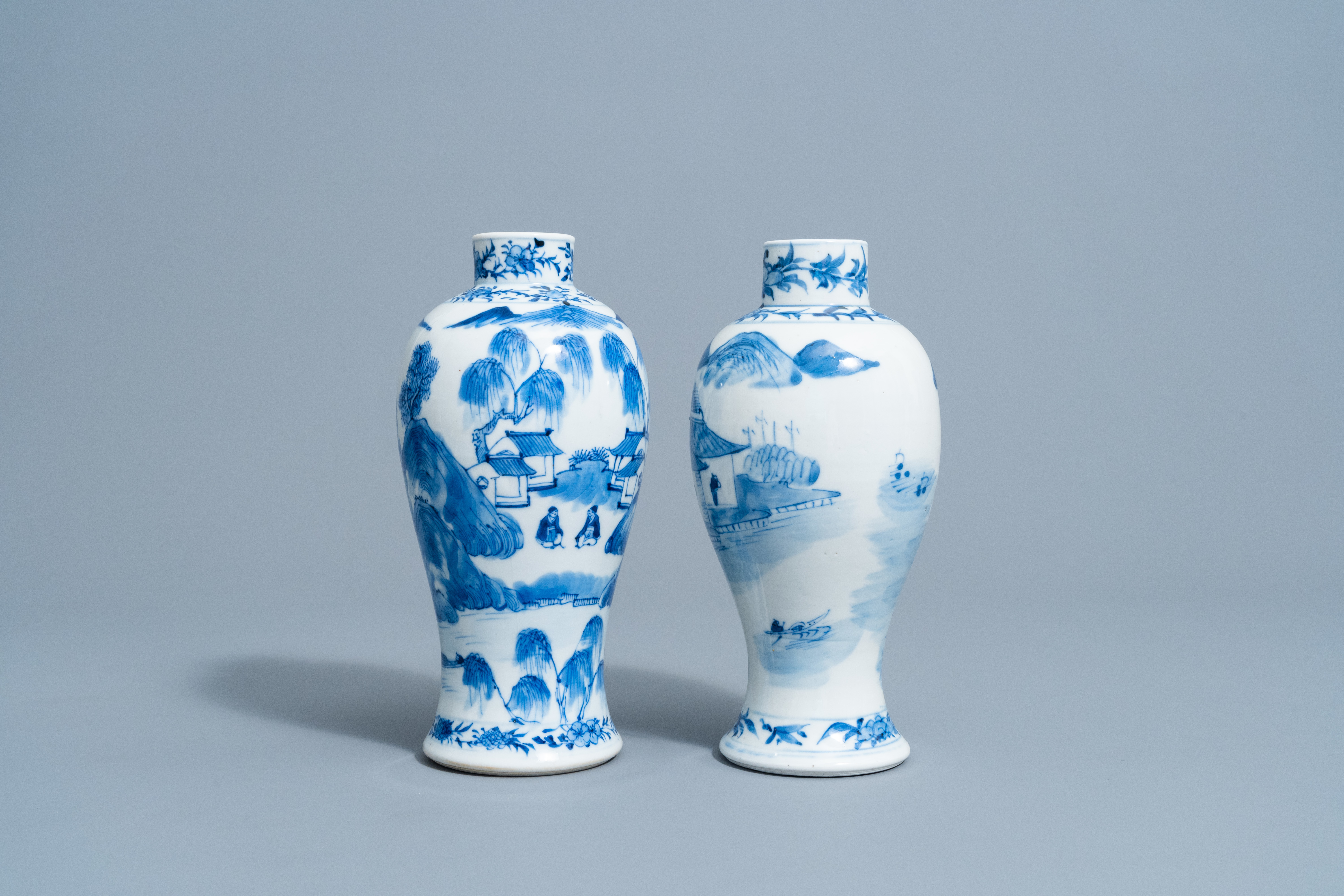 Two Chinese blue and white baluster shaped vases with an animated mountain landscape all around, Kan - Image 3 of 6