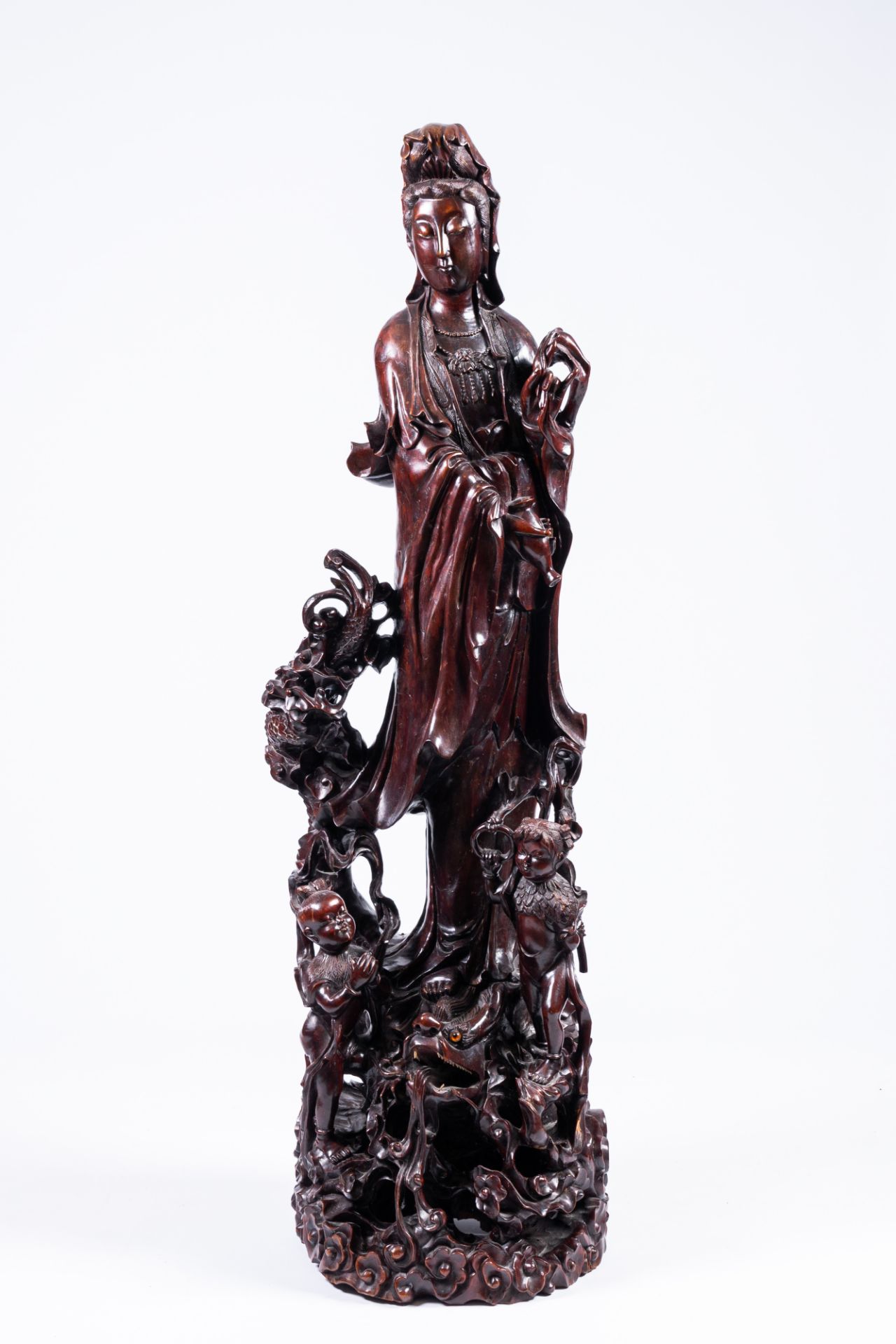 A massive Chinese carved wood group with a Guanyin, children and a dragon, 20th C. - Image 3 of 14