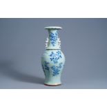 A Chinese blue and white celadon ground vase with floral design, 19th C.