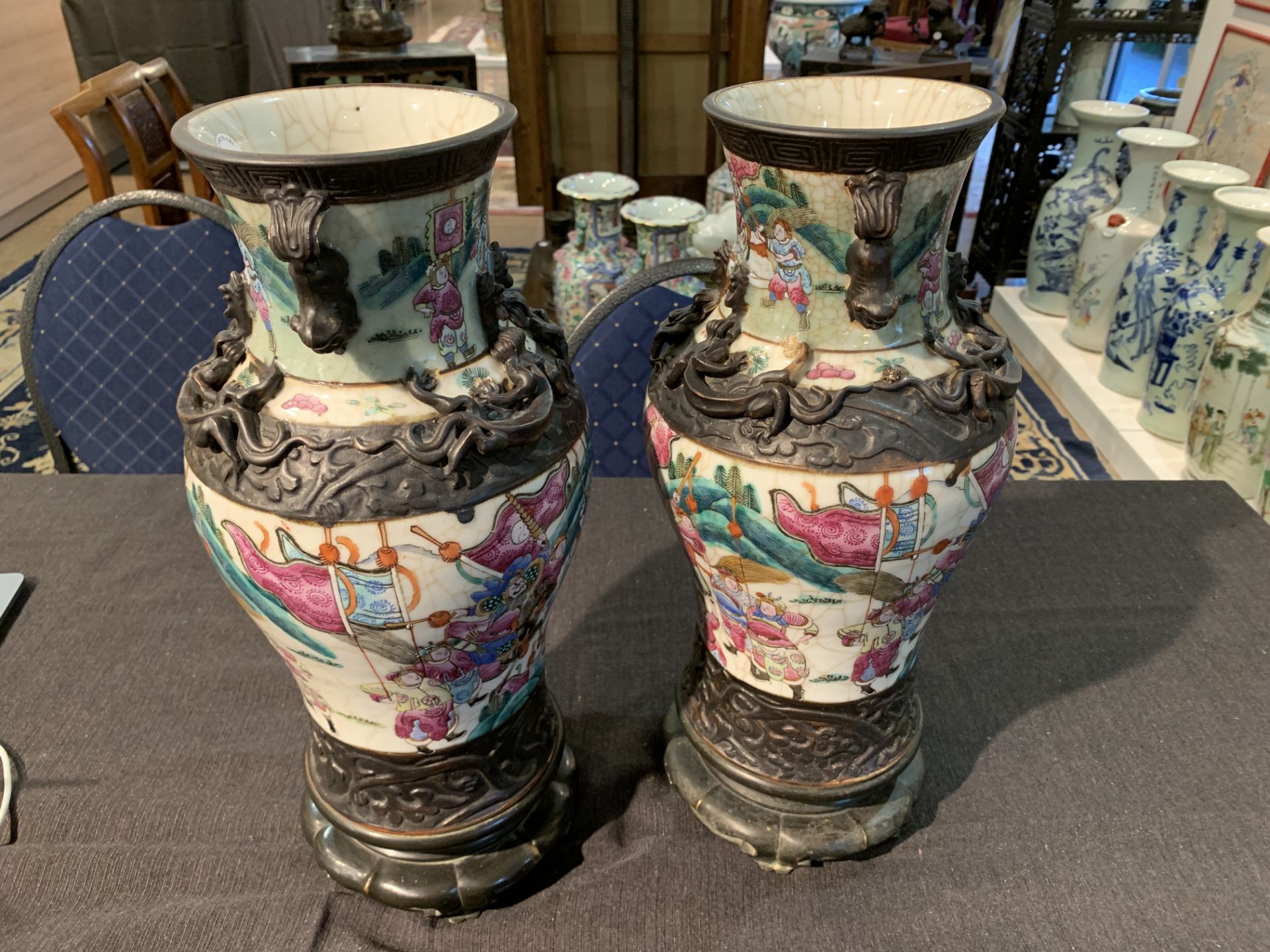 A pair of Chinese Nanking crackle glazed famille rose vases with warrior scenes on bronze lotus shap - Image 10 of 11