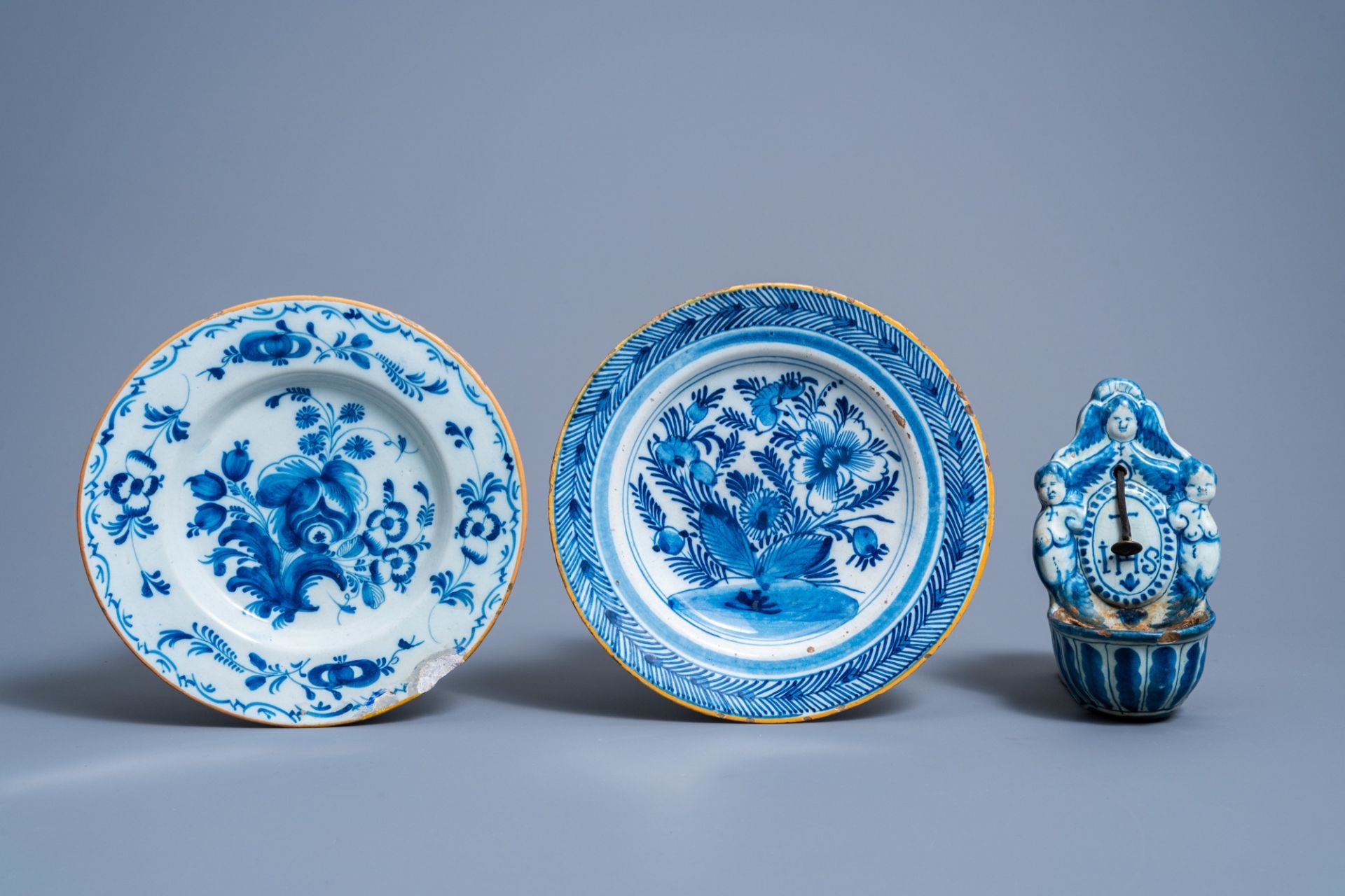 A Brussels blue and white tobacco jar, six Dutch Delft plates with floral design and a holy water fo - Image 7 of 14