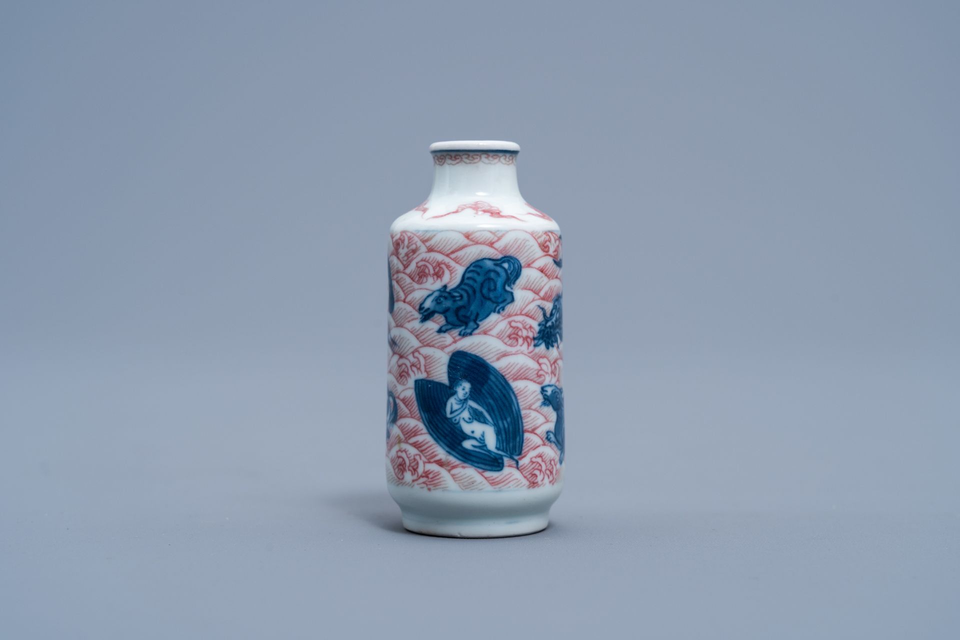 A Chinese blue, white and copper red 'animals' snuff bottle, Yongzheng mark, 20th C. - Image 4 of 6