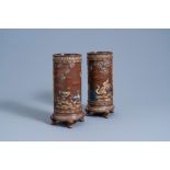 A pair of Mettlach vases with relief design of geese and ducks among bamboo in the evening sun, Vill