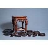 A collection of Chinese carved wood stands, one of which with marble top, 19th/20th C.