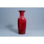 A Chinese monochrome sang de boeuf glazed vase, 19th/20th C.