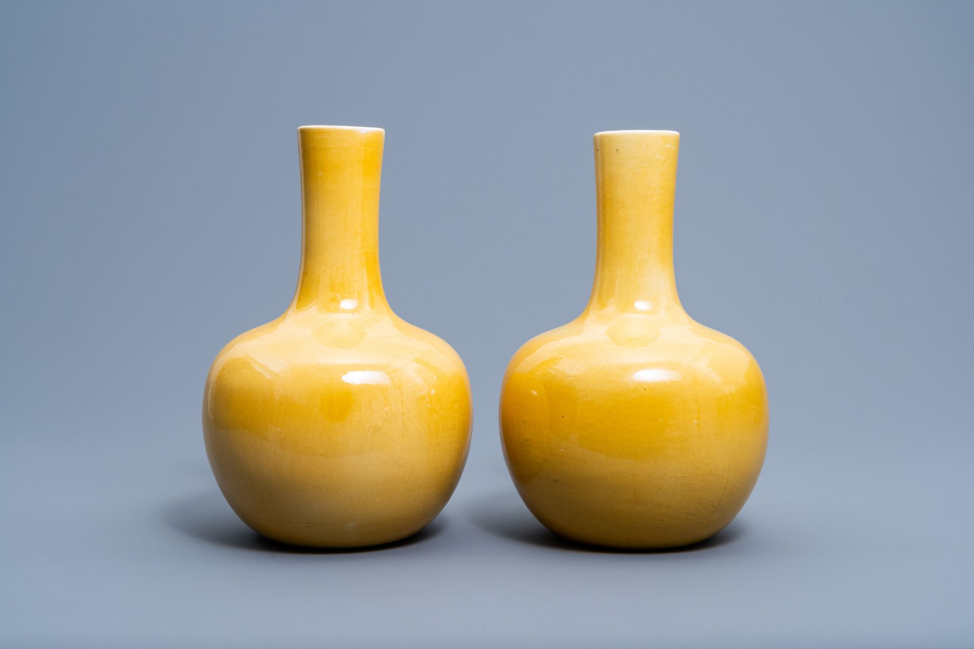 A pair of Chinese monochrome yellow tianqu ping vases, 20th C. - Image 4 of 6