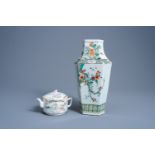 A Chinese famille verte vase with floral design and a qianjiang cai teapot and cover with figures in