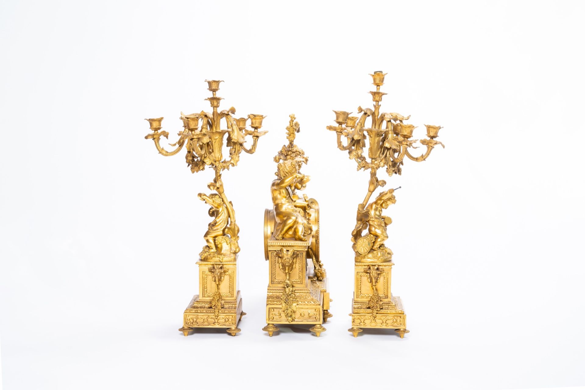 A French gilt bronze three-piece clock garniture with musicians and Svres style plaques, 19th C. - Image 4 of 21