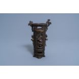 A Chinese bronze incense stick holder with applied design of foreigners, Ming