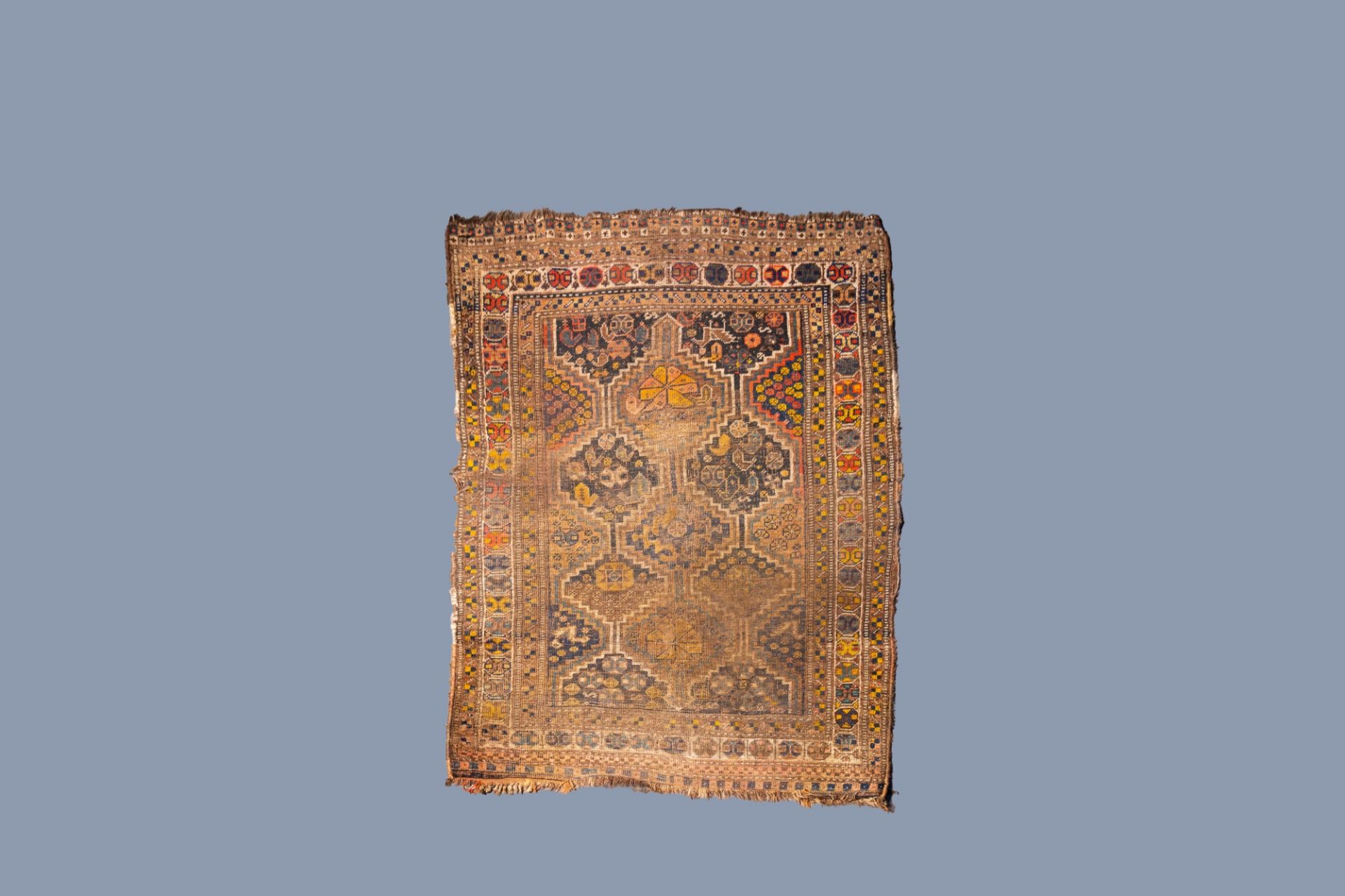 A Persian Khamseh 'Chicken' rug, wool on cotton, 19th C.