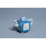 A square Chinese blue and white reticulated teapot and cover with floral design, Kangxi