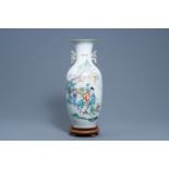 A Chinese famille rose vase with a lady, playing children and a cat in a garden, 19th/20th C.