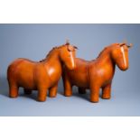 A pair of leather pony ottomans in the manner of Dimitri Omersa (1927-1975), 20th C.