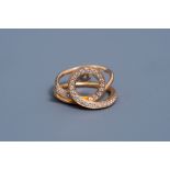 An 18 carat yellow gold ring set with 34 diamonds, 20th C.