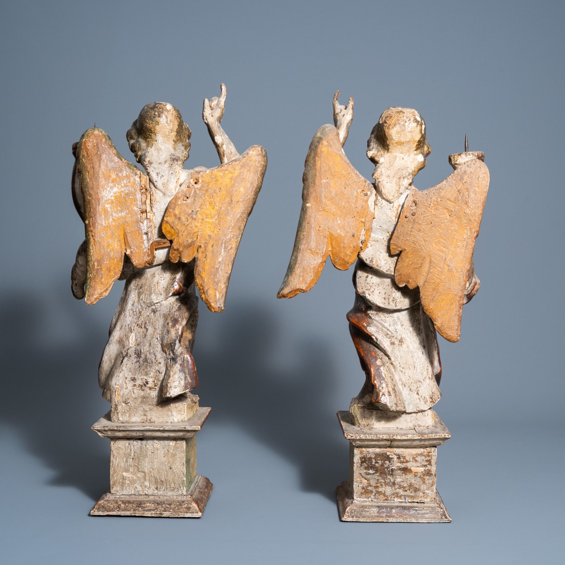 A pair of Italian carved, polychrome painted and gilt wooden angel shaped candlesticks, 18th C. - Image 6 of 9