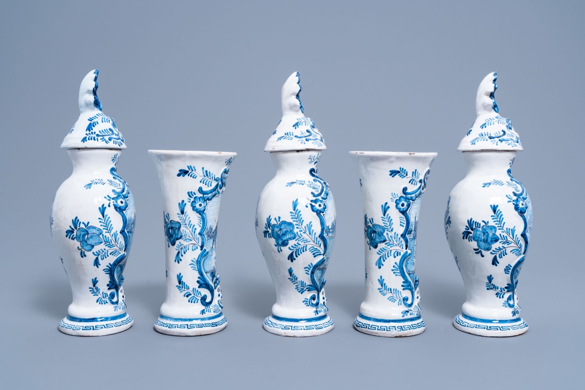 A five-piece Dutch Delft blue and white vase garniture with ice skaters, 19th C. - Image 4 of 6