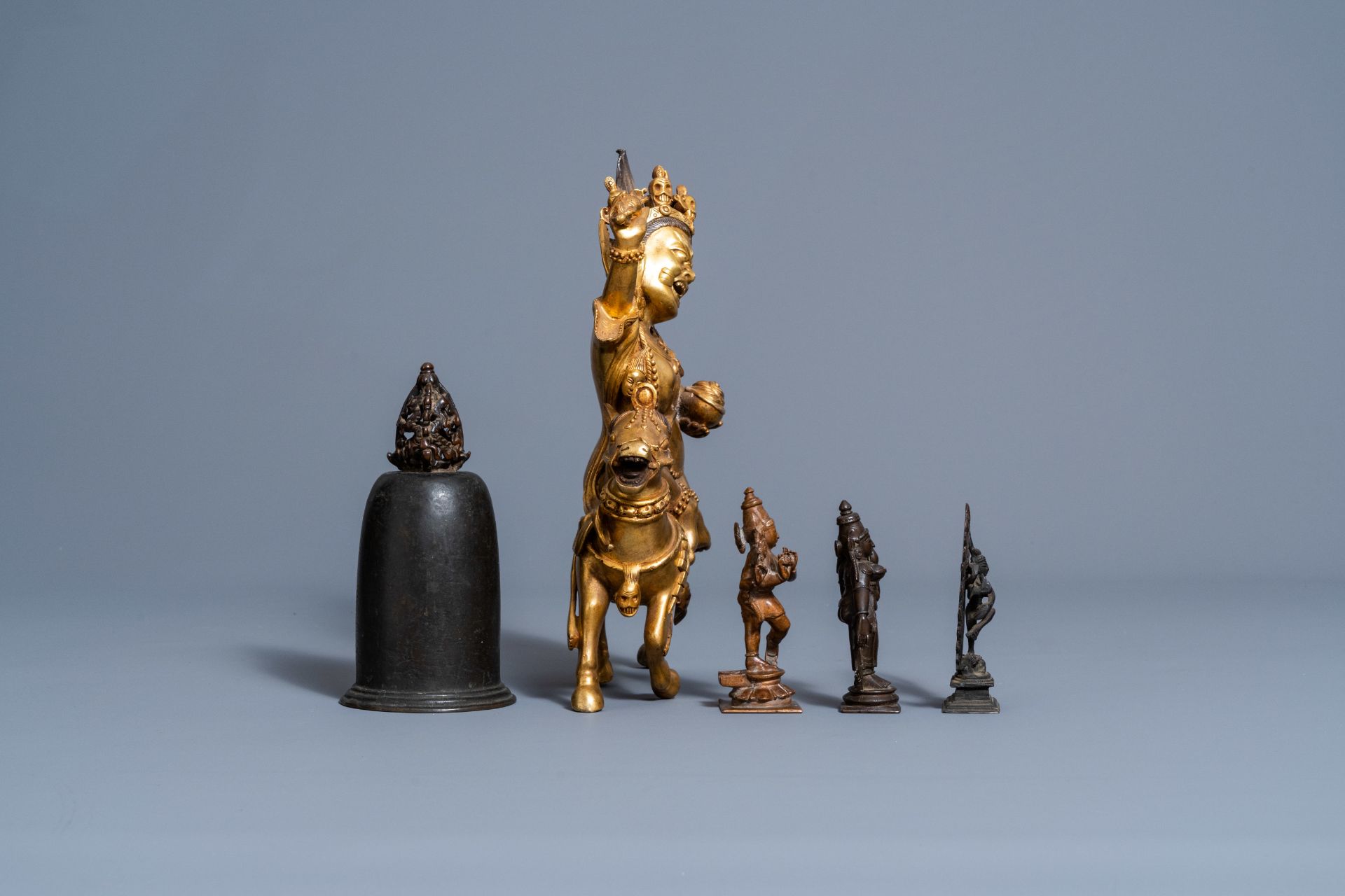 A Sino-Tibetan gilt bronze figure of Mahakala on horseback, a bronze bell and three various Indian s - Image 5 of 7