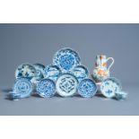 A varied collection of Chinese blue, white and famille verte porcelain with fish, landscapes and flo