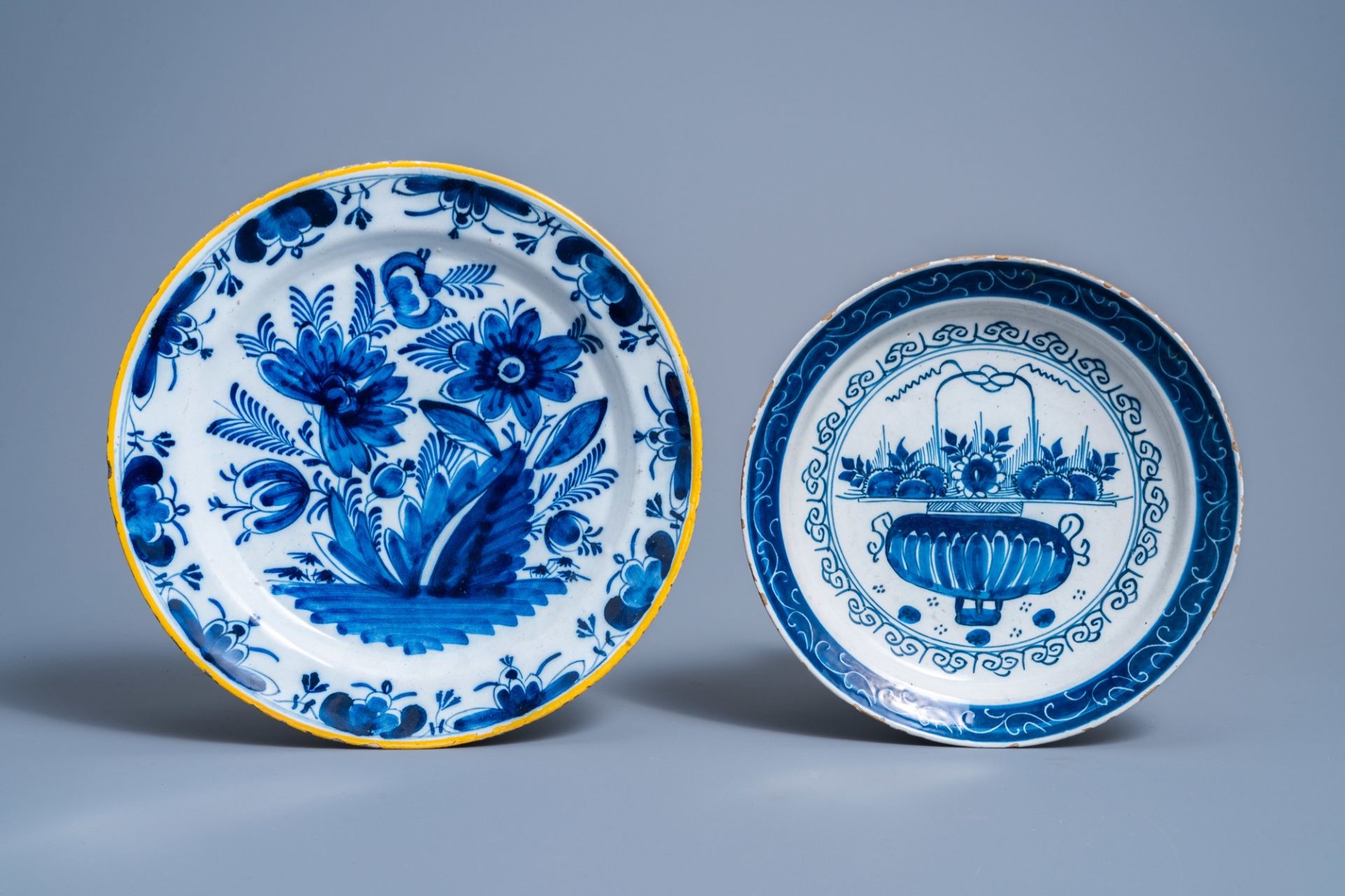 A Brussels blue and white tobacco jar, six Dutch Delft plates with floral design and a holy water fo - Image 5 of 14